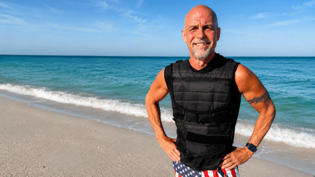 Eric Webber on the beach representing strength and healthy aging for men over 50